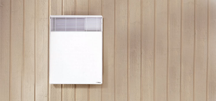 radiateur installé sur un mur en bois